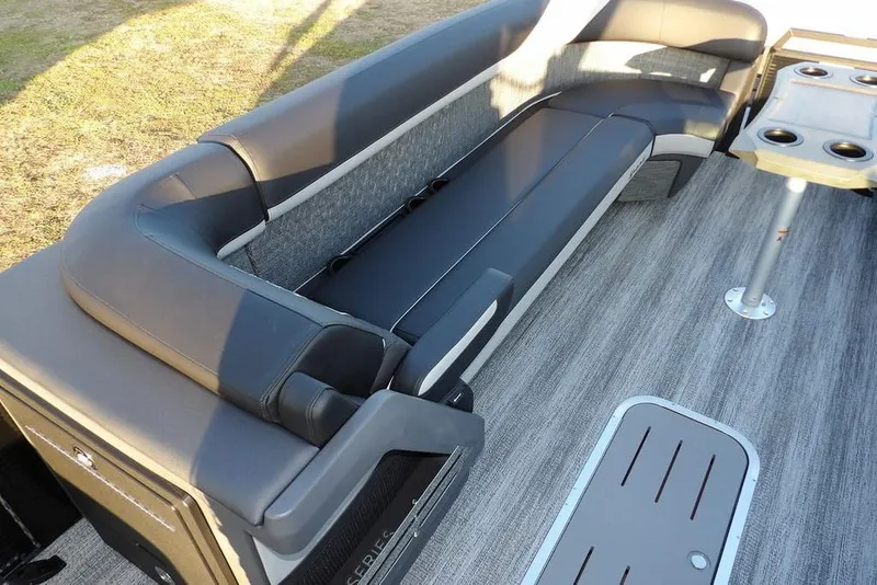 Slide: The Image of 2026 Bennington M Swingback 26 MSB interior with sleek seating and table setup. - 20