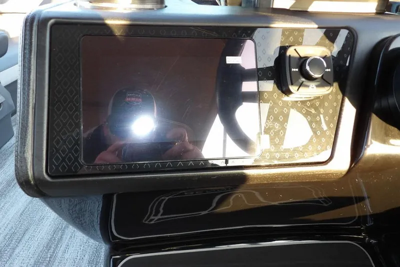 Slide: The Image of Dashboard of 2026 Bennington M Swingback 26 MSB with control panel and display. - 27