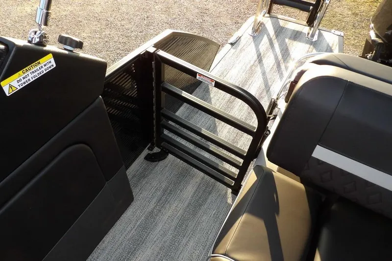 Slide: The Image of 2026 Bennington M Swingback 26 MSB interior with open gate and seating area. - 35