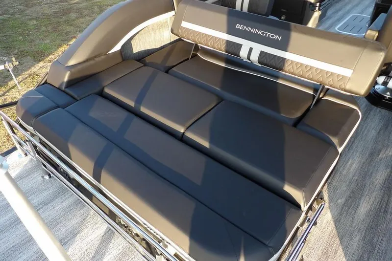 Slide: The Image of 2026 Bennington M Swingback 26 MSB boat with luxurious seating and sleek design. - 38