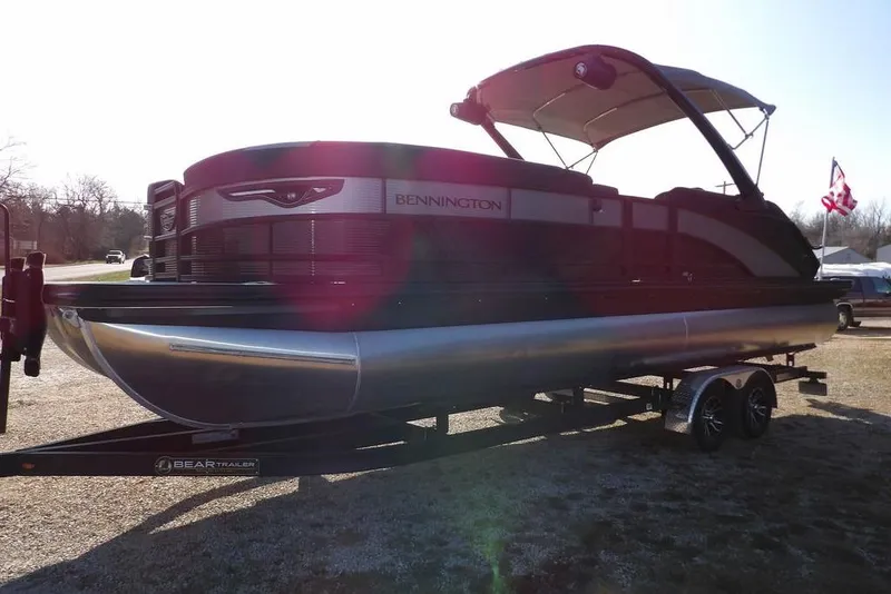 Slide: The Image of 2026 Bennington M Swingback 26 MSB pontoon boat on trailer, side view. - 4