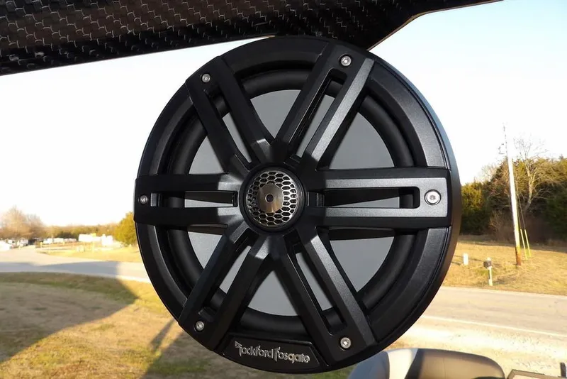 Slide: The Image of Close-up of a Rockford Fosgate speaker on a 2026 Bennington M Swingback 26 MSB. - 41