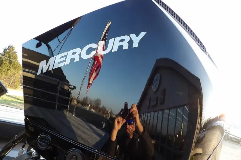 Slide: The Image of Reflection on Mercury engine of 2026 Bennington M Swingback 26 MSB boat. - 43