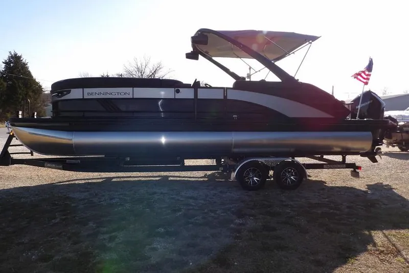 Slide: The Image of 2026 Bennington M Swingback 26 MSB pontoon boat on trailer, side view. - 5