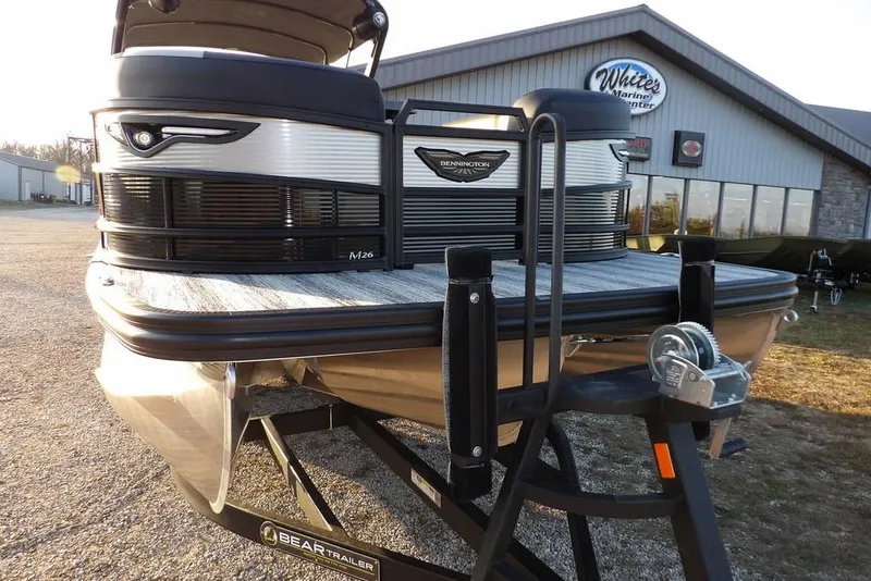 Slide: The Image of 2026 Bennington M Swingback 26 MSB pontoon boat on trailer at White's Marine Center. - 50