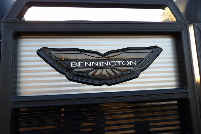 Slide: The Image of 2026 Bennington M Swingback 26 MSB logo on sleek metallic background. - 52