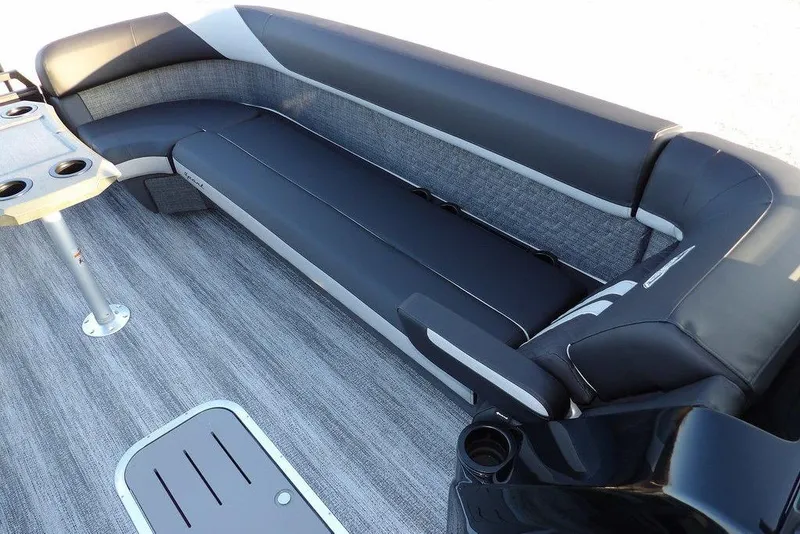 Slide: The Image of Luxurious seating area on 2026 Bennington M Swingback 26 MSB pontoon boat, featuring sleek design. - 8