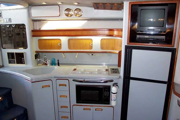Slide: The Image of Sea Ray 420 Sundancer 1990 - 2