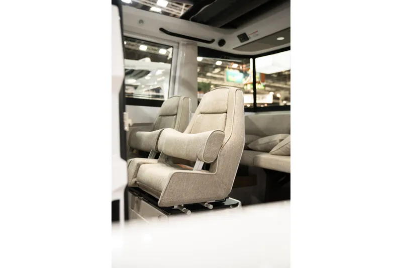 Slide: The Image of Interior of 2026 Axopar 29 XC Cross Cabin with comfortable seating. - 10