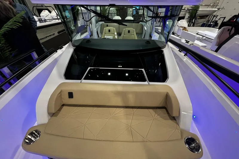 Slide: The Image of 2026 Axopar 29 XC Cross Cabin boat interior with seating and modern design. - 20