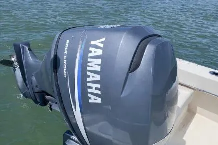 Slide: The Image of 2008 Jones Brothers 18 Cape Fisherman with Yamaha outboard motor on water. - 11