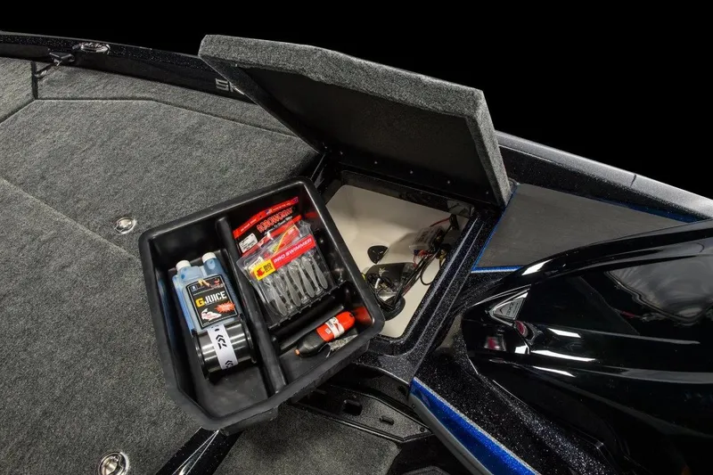 Slide: The Image of Manufacturer Provided Image: Storage compartment in 2026 Skeeter ZXE20 boat with fishing gear and supplies. - 5
