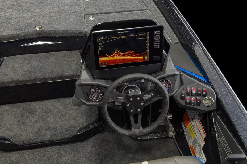 Slide: The Image of Manufacturer Provided Image: 2026 Skeeter ZXE20 boat dashboard with advanced navigation display and control panel. - 6