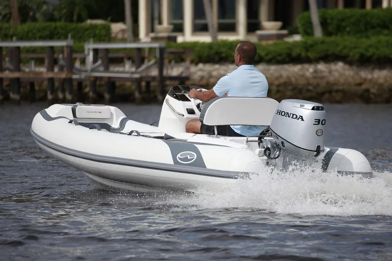 The Image of Manufacturer Provided Image: Walker Bay Generation 11 LTE 2025 boat with Honda engine on water. - 0