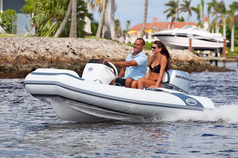 Slide: The Image of Manufacturer Provided Image: Walker Bay Generation 11 LTE 2025 boat cruising on a sunny day. - 2