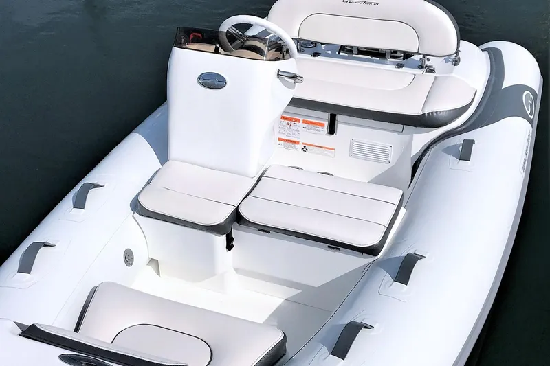 Slide: The Image of Manufacturer Provided Image: Walker Bay Generation 12 LTE 2025 inflatable boat with white seating and steering console. - 3