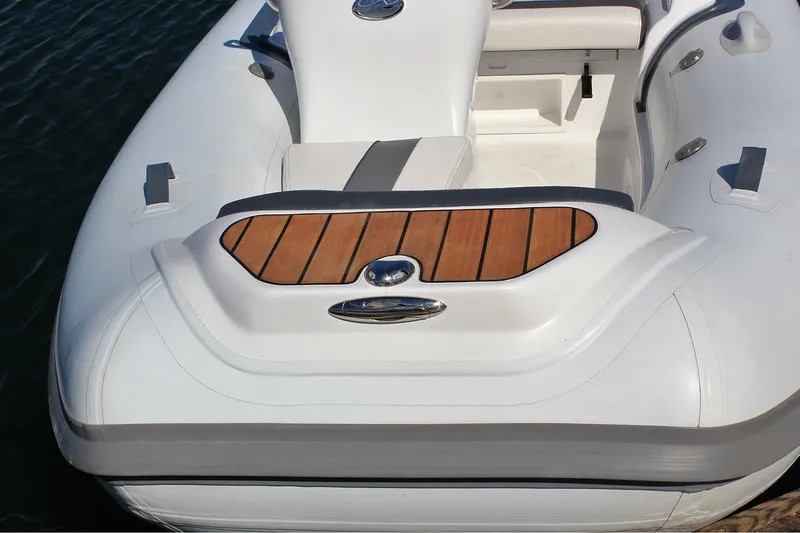 Slide: The Image of Manufacturer Provided Image: Walker Bay Generation 360 DLX 2025 boat with teak deck detail. - 7