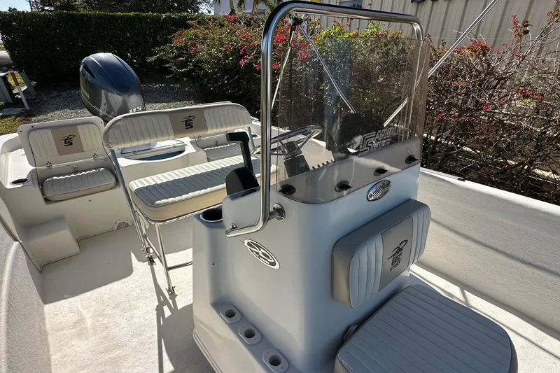 Slide: The Image of 2017 Carolina Skiff 198 DLV boat interior with seating and console. - 15