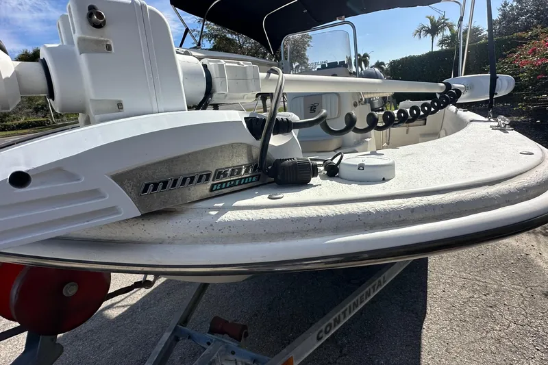 Slide: The Image of 2017 Carolina Skiff 198 DLV boat with Minn Kota Riptide trolling motor. - 5