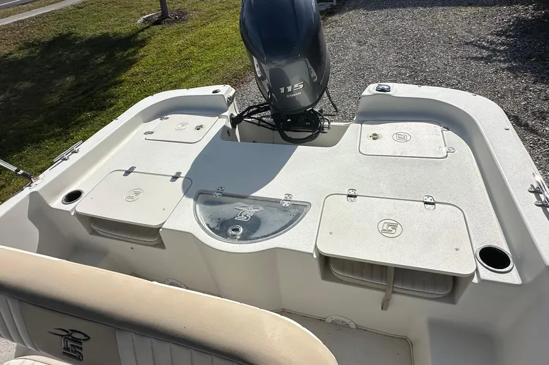 Slide: The Image of 2017 Carolina Skiff 198 DLV boat with Yamaha 115 engine, rear deck view. - 8