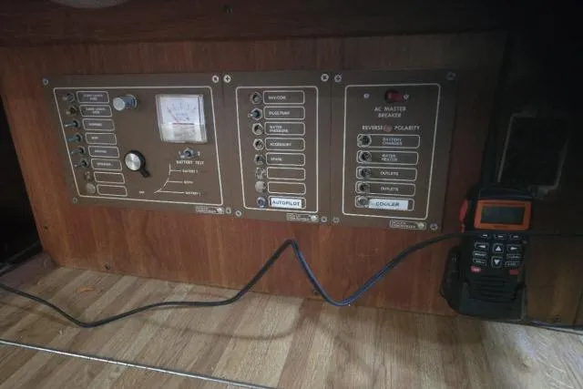 Slide: The Image of Electrical control panel on a 1980 CAL 39 sailboat with radio equipment. - 6