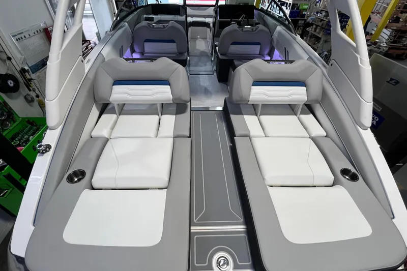 Slide: The Image of 2024 Regal LS4 Surf boat interior with luxurious seating and modern design. - 6
