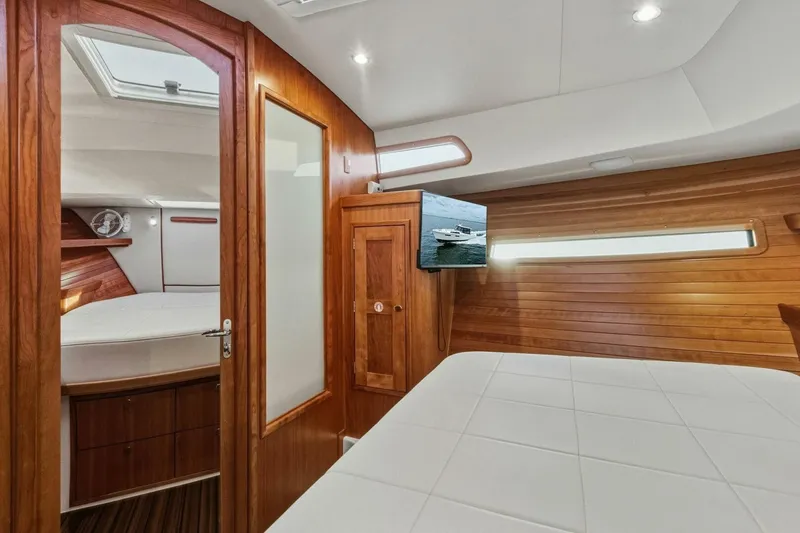 Slide: The Image of Luxurious interior of 2025 MJM 42 yacht with wood paneling and modern amenities. - 18