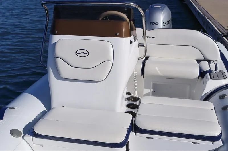 Slide: The Image of Manufacturer Provided Image: 2025 Walker Bay Venture 16 boat interior with seating and console. - 8