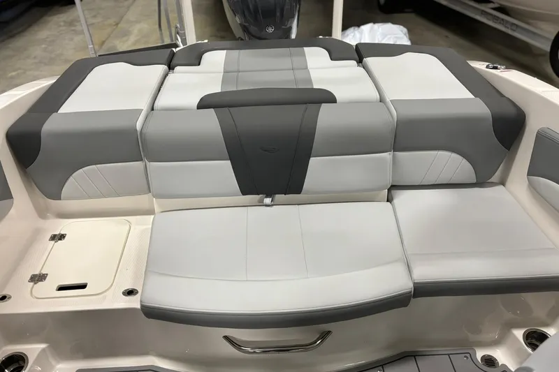 Slide: The Image of 2026 Chaparral 21 SSi OB boat interior with gray and white seating. - 14