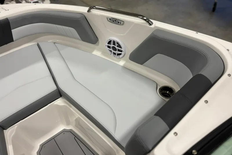 Slide: The Image of 2026 Chaparral 21 SSi OB boat interior with gray seating and speaker. - 22