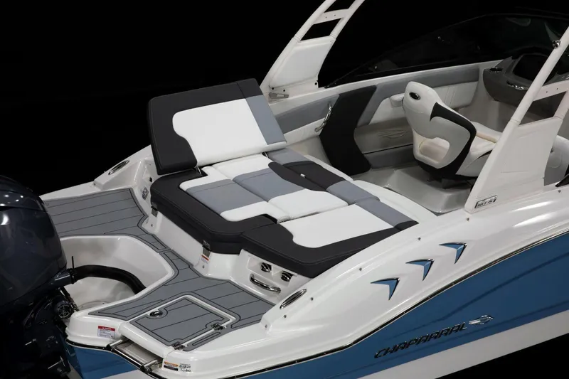 Slide: The Image of 2026 Chaparral 21 SSi OB boat interior with seating and storage compartments. - 7