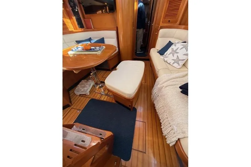 Slide: The Image of Luxurious interior of a 2002 Hylas 46 yacht with elegant wood finish. - 20