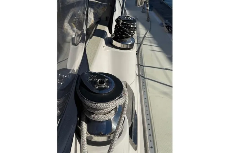 Slide: The Image of Winch and rope detail on 2002 Hylas 46 sailboat deck. - 39