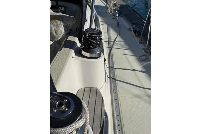 Slide: The Image of Deck view of a 2002 Hylas 46 sailboat, featuring winches and rigging. - 40