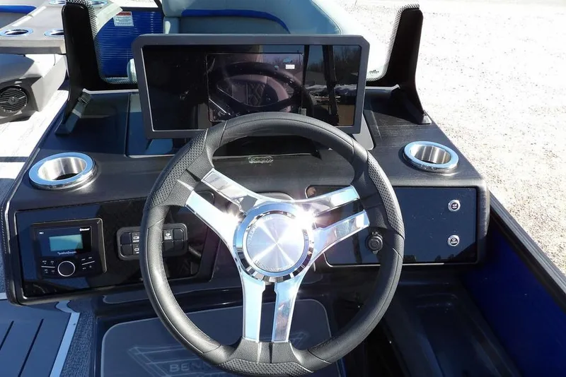 Slide: The Image of Steering wheel and dashboard of 2026 Bennington M Quad Bench 22 MFB boat. - 21