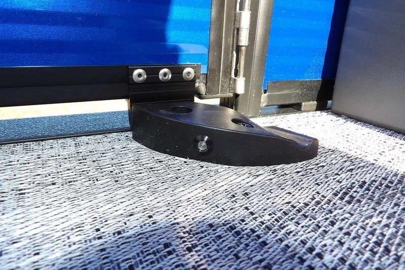 Slide: The Image of Close-up of Bennington M Quad Bench 22 MFB 2026 hinge detail on textured surface. - 34