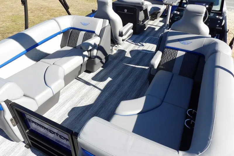 Slide: The Image of 2026 Bennington M Quad Bench 22 MFB pontoon boat interior with luxurious seating. - 36
