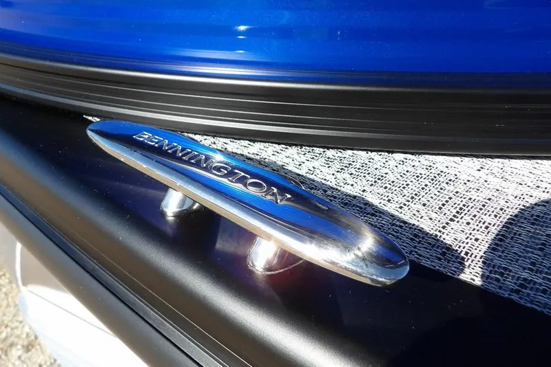 Slide: The Image of Close-up of Bennington M Quad Bench 22 MFB 2026 boat cleat in sunlight. - 44