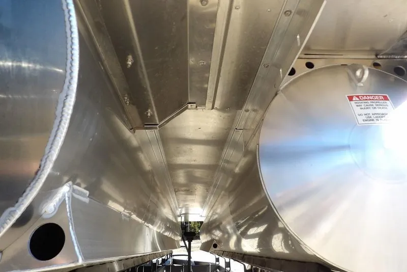 Slide: The Image of Underneath view of 2026 Bennington M Quad Bench 22 MFB pontoon boat structure. - 46