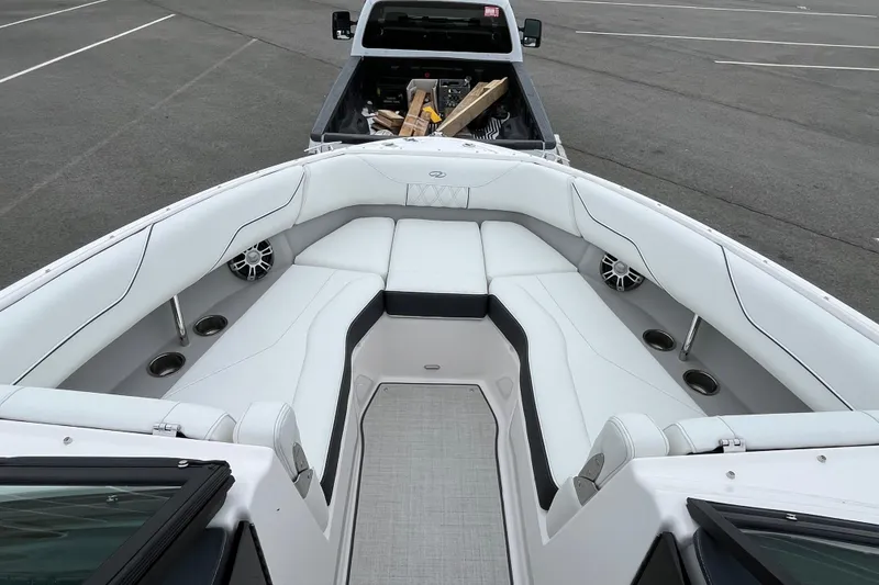 Slide: The Image of Interior of 2025 Regal LS4 boat with white seating. - 9