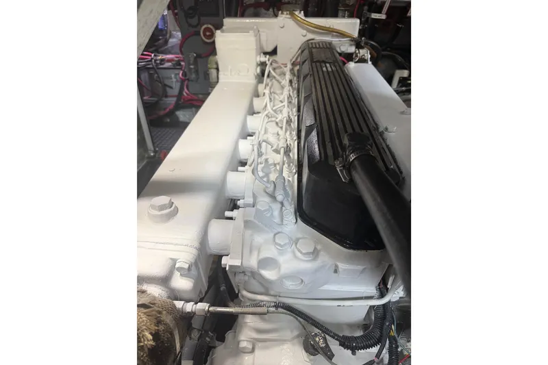 Slide: The Image of Engine of a 1989 Nordhavn 46 yacht, showcasing detailed mechanical components. - 34