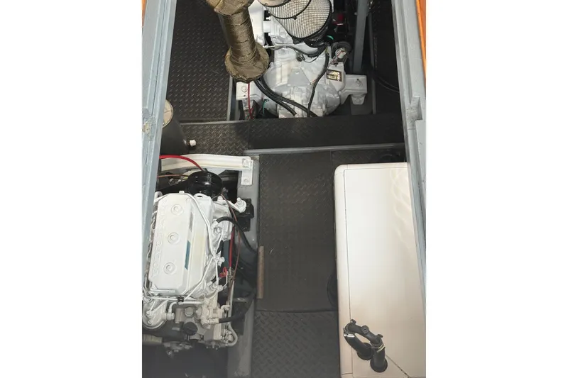 Slide: The Image of Engine room of 1989 Nordhavn 46 yacht, showcasing mechanical components and equipment. - 37