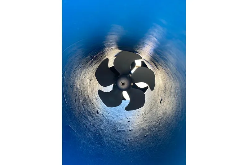 Slide: The Image of Close-up of a Nordhavn 46 propeller inside a blue tunnel, 1989 model. - 5
