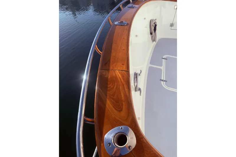 Slide: The Image of 1989 Nordhavn 46 boat deck with polished wood and stainless steel fittings. - 9