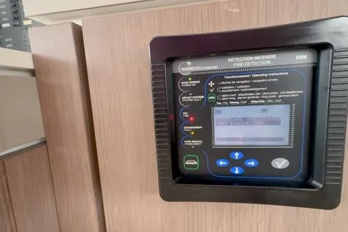 Slide: The Image of Fire detection panel on Bali 5.4 yacht, 2021 model, with control buttons and display. - 14