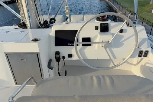 Slide: The Image of Cockpit of 2021 Bali 5.4 yacht with steering wheel and navigation equipment. - 15
