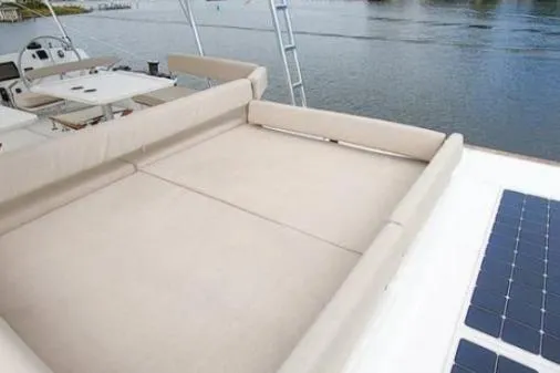 Slide: The Image of Luxury Bali 5.4 yacht deck with sunbathing area and solar panels, 2021 model. - 20