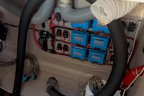 Slide: The Image of Electrical system setup in a 2021 Bali 5.4 model boat. - 34
