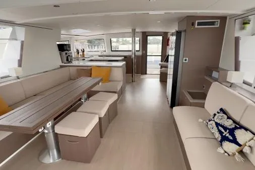 Slide: The Image of Luxurious interior of 2021 Bali 5.4 catamaran with modern seating and dining area. - 5
