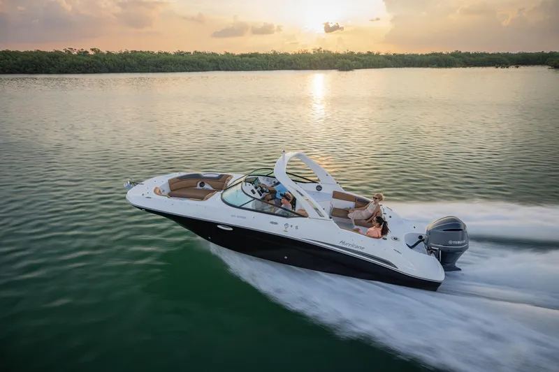 The Image of 2026 Hurricane SunDeck 2690 OB cruising on serene waters at sunset. - 0